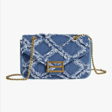 Denim Crossbody Bag with adjustable gold chain and distressed diamond pattern, perfect for casual and chic outfits. Made from durable denim material.